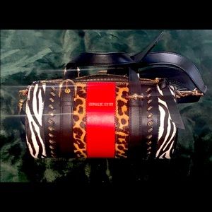 Michael kors animal print barrel purse